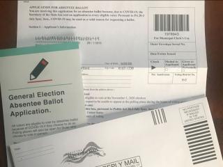 Absentee ballot with insert and envelope